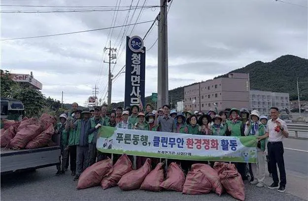 청계면 새마을·부녀회, 손수 베푼 봉사로 '꽃길' 만들었다